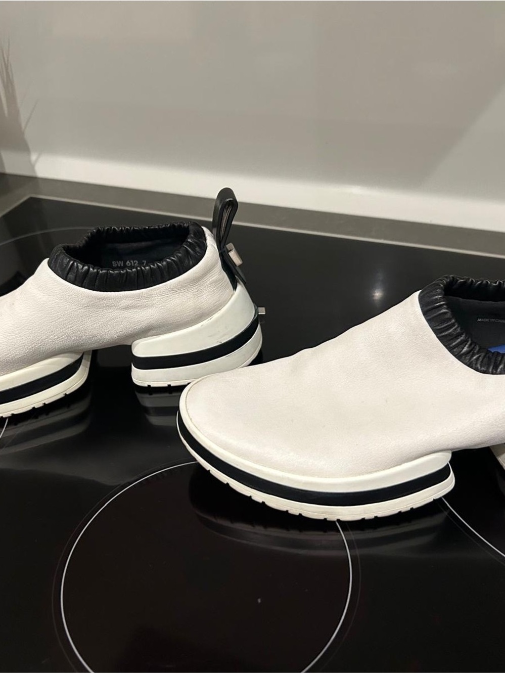 Stuart Weitzman White and Black Slip-On Sneakers